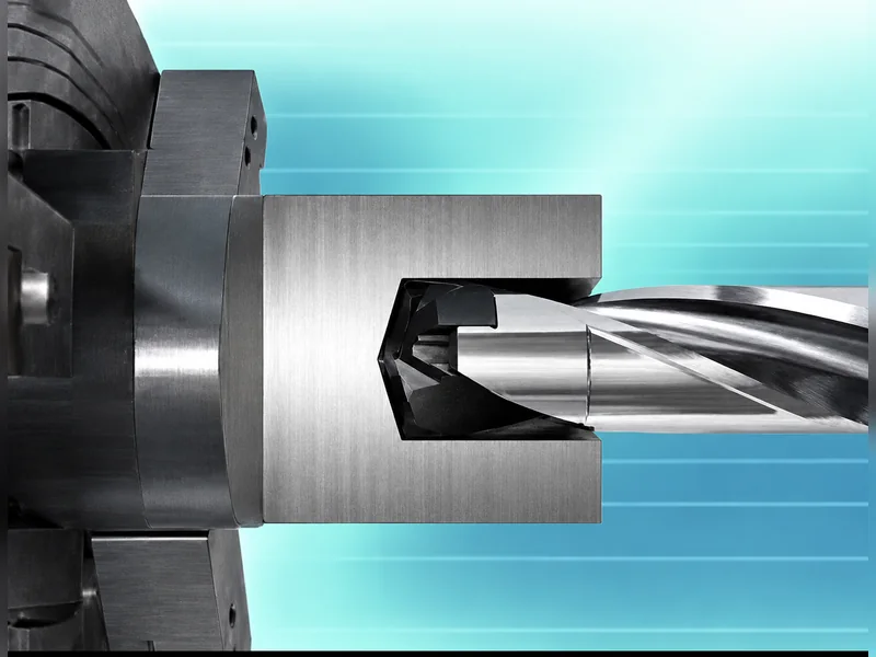 Illustration of a drill entering a workpiece.