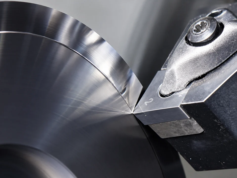 CBN insert performing continuous turning on a hardened-steel workpiece.