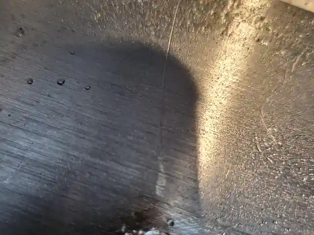 Stainless steel drilling surface showing heat and work hardening risk