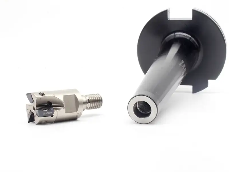 Indexable plunge milling cutter and holder for heavy roughing and deep cavity machining