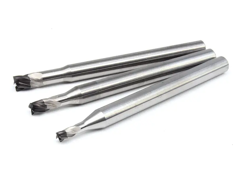 Three Sundi solid-nib PCD flat end mills on a white background